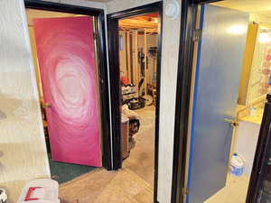 Hall featuring light flooring