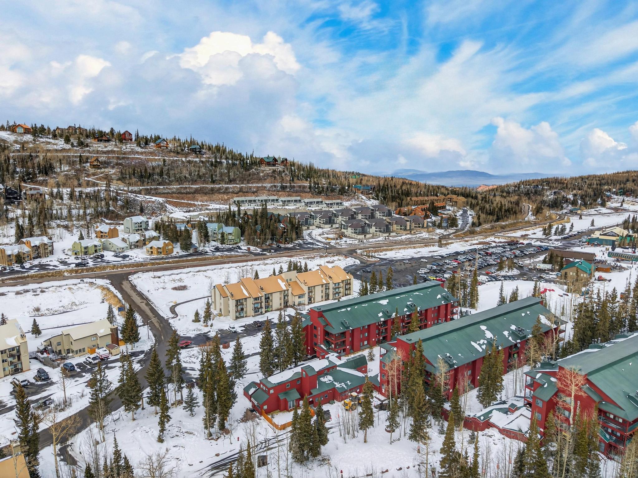 Snowy aerial view with a mountain view