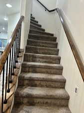 Stairs featuring recessed lighting