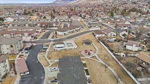 Aerial overview of property's location with nearby suburban area