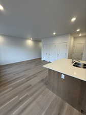 Kitchen featuring recessed lighting and light wood-style flooring