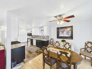 Dining room featuring light wood-style floors, recessed lighting, and a ceiling fan