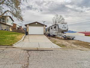Detached Garage View with 48ft RV Parking on side