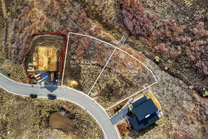 Aerial overview of property's location featuring property parcel outlined