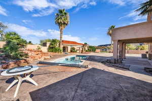 Swimming pool featuring a patio