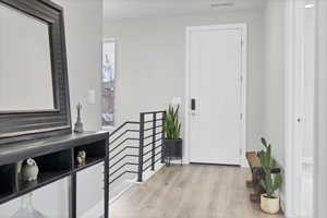 Entryway featuring light wood-type flooring