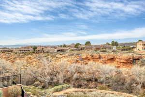 View of local wilderness with nearby suburban area