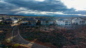 Aerial view of residential area featuring a mountain backdrop