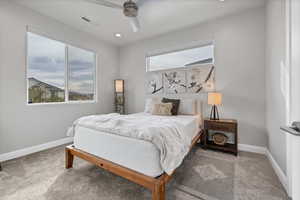 Bedroom featuring carpet, a ceiling fan, and recessed lighting