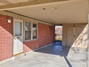 View of patio / terrace featuring a gate