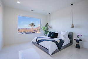 Bedroom featuring tile patterned floors and recessed lighting