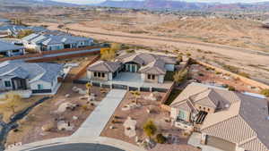Aerial view of residential area featuring a mountainous background