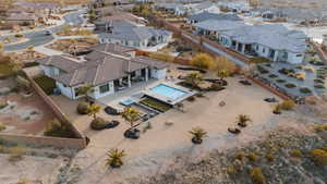 Aerial view of residential area featuring a pool