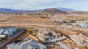 Aerial view of residential area with a mountain backdrop