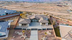 View of subject property featuring a desert landscape