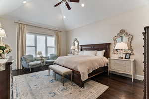 Bedroom with recessed lighting, dark wood finished floors, vaulted ceiling, and a ceiling fan