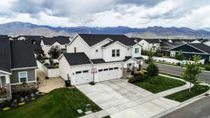 Aerial perspective of suburban area featuring mountains