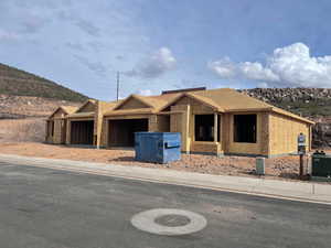 Property under construction with a mountain view