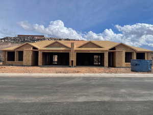 Property under construction featuring roof with shingles