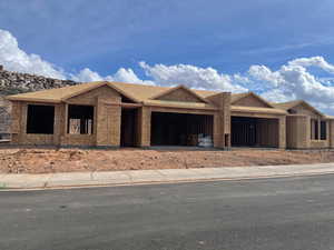 Property under construction featuring roof with shingles