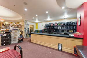 Miscellaneous room with ornamental molding and recessed lighting
