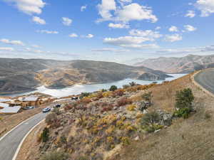 Mountain view featuring a nearby body of water