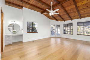 Owners suite full of beautiful accents, lots of windows with automated shades and a make-up vanity/desk space