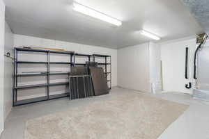 Large storage room with epoxy and carpet