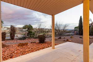 Fenced backyard featuring view from covered patio