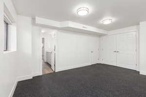 Bedroom #3 in basement with professional gym flooring installed