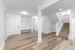 Basement is bright and light with beautiful barn wood LVP flooring