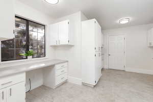 Craft/computer desk, lots of storage in mud room