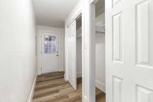 Outside entrance and garage entrance with storage closets