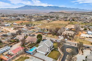 Aerial view of residential area featuring mountains