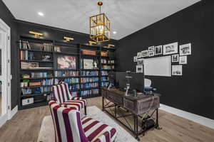 Office area with suspended lighting