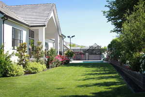 Fenced backyard with covered porch