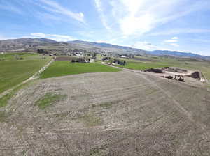View of mountain background featuring rural landscape and large plots for crops