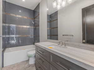 Full bath with washtub / shower combination and vanity