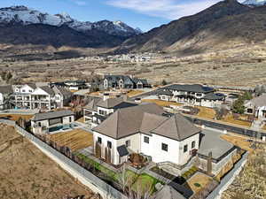 Aerial view of residential area featuring a mountain backdrop