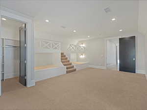 Bedroom featuring light carpet and recessed lighting