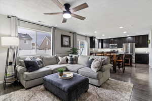 Living area featuring a cozy fireplace with custom built-ins and interior design details.