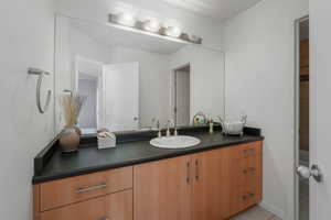Bathroom featuring vanity and light tile patterned floors