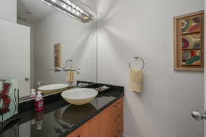 Half bathroom with vanity