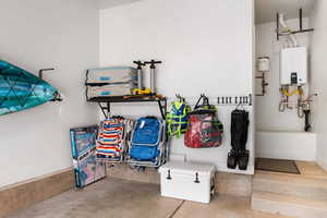 Garage featuring baseboards