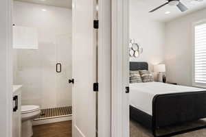 Bedroom featuring dark wood finished floors, recessed lighting, and ceiling fan
