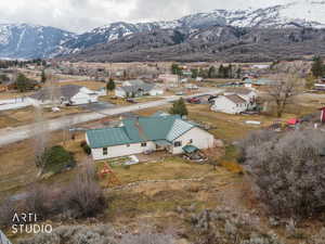 Aerial view of residential area featuring a mountain backdrop