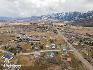 Aerial view of property's location with nearby suburban area and rural landscape