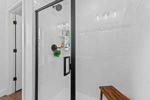 Full bath featuring a stall shower