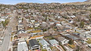 View of property location featuring a mountainous background and nearby suburban area