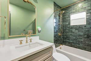 Full bath with vanity and shower / bathtub combination